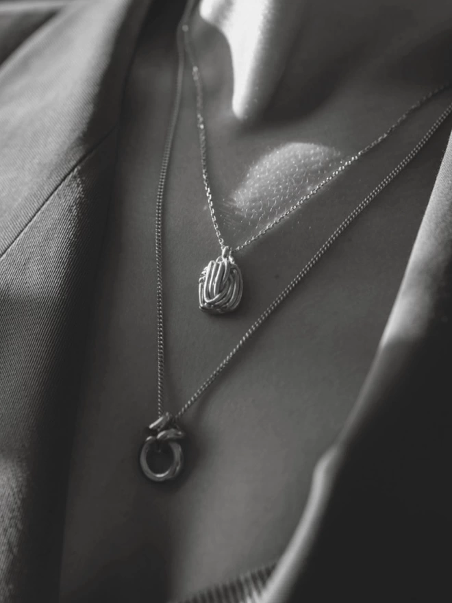 layered weighty sterling silver necklaces