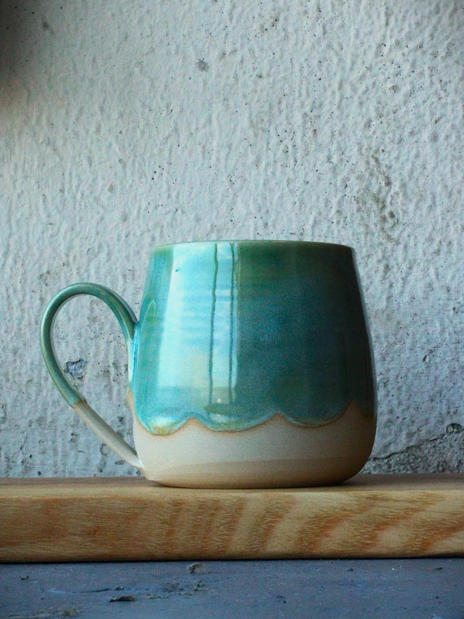 ceramic mug with green glaze