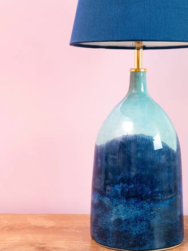 Bottle lamp with shades of blues
