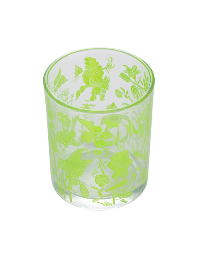 laura's floral, wild fig & grape charity candle in a reusable glass with bright green illustrations