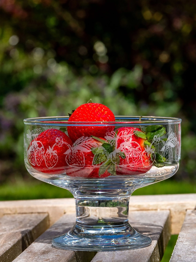 Strawberry pattern glass dessert bowl filled with strawberries