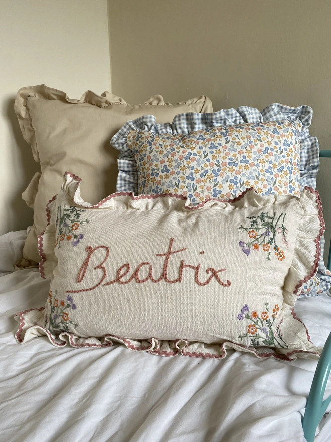 Linen Cushion With Embroidered Floral Border And Ruffle Trim