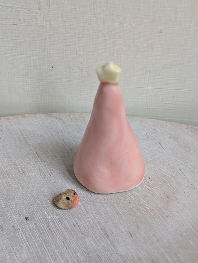 pink ceramic christmas tree and tiny robin bird