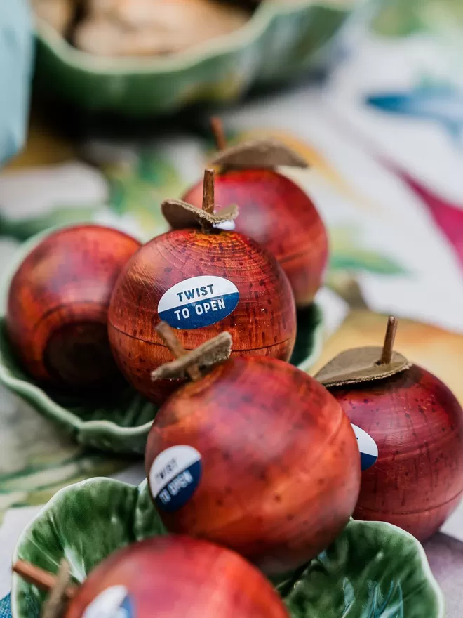 Wooden apple ornaments, hand painted.