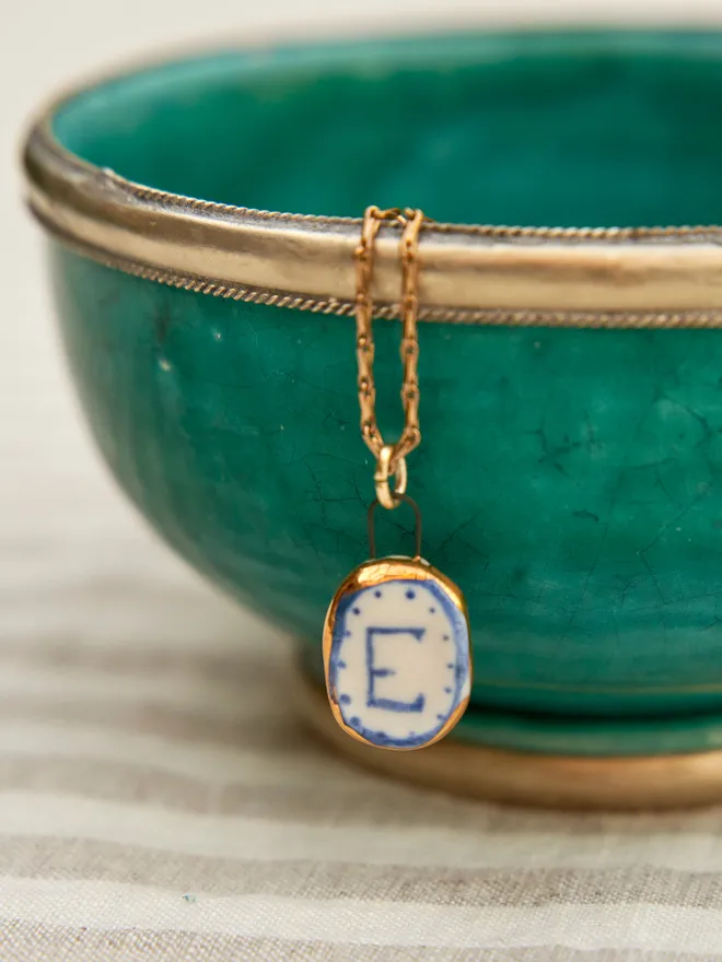 Gold initial pendant