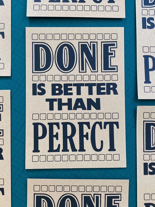 Done is better than Perfct Screen Print (blank ink on brown paper)