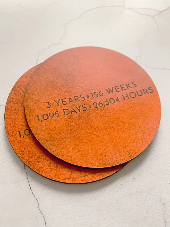 Tan third anniversary leather coasters