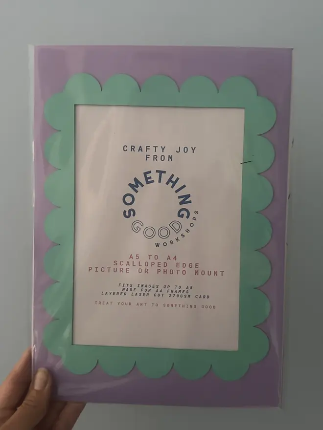 Scallop Edged A5 / A4 photo mount. purple and blue mount photographed against grey background.