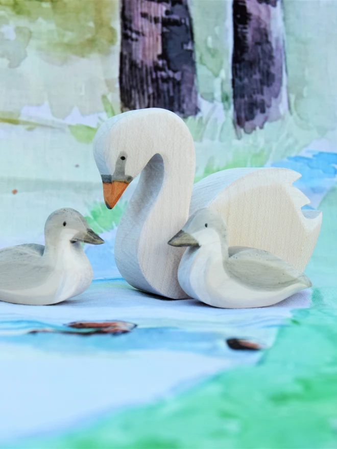 Handmade ecofriendly wooden toy figurines, swan and cygnet toy figures made by hand by Eric and Albert made in Wales, UK