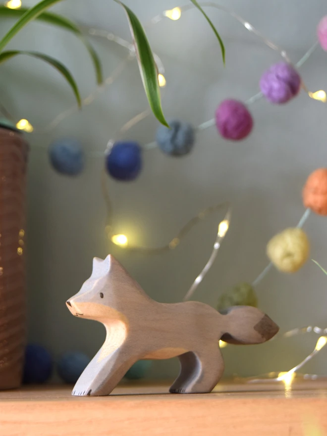 wooden standing wolf cub toy made by eric and albert