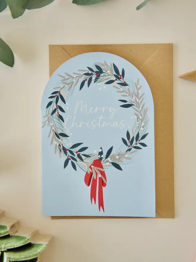 Botanical Wreath merry Christmas card with blue background
