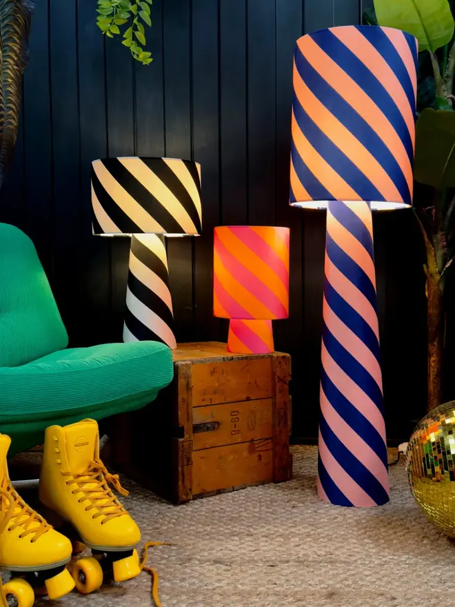 Portable Helter Skelter Velvet Lamps, in a room. 