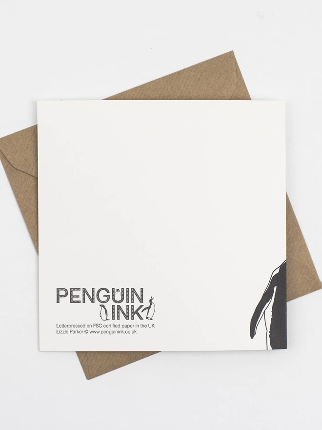 Back of the card showing the Penguin Ink logo and the flipper of one of the penguins