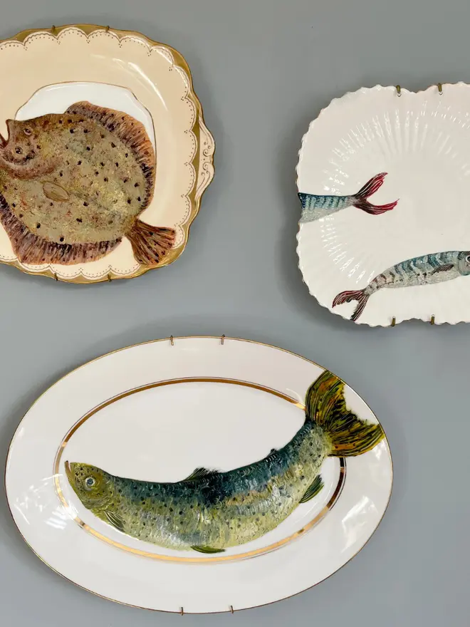 plate-scape hanging on a grey wall  