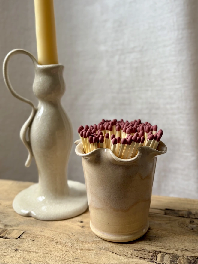 Rose pink frilly matchstick pot with matches