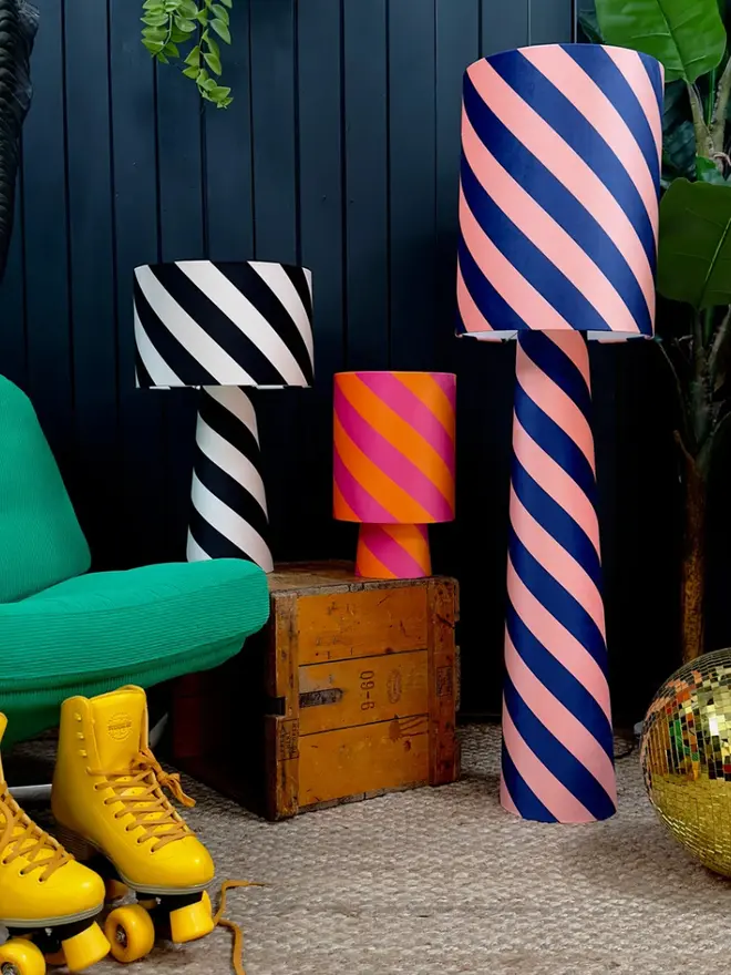 Portable Helter Skelter Velvet Lamps, in a room. 