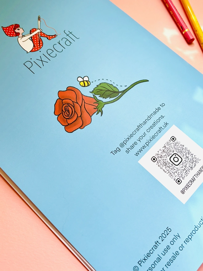 Back page of illustrated floral colouring book with blue cover and Pixiecraft logo