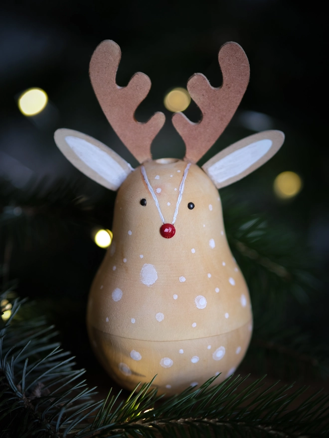 Handcrafted wooden Rudolph Christmas decoration opened to reveal a tiny “Dear Rudolph” note, 