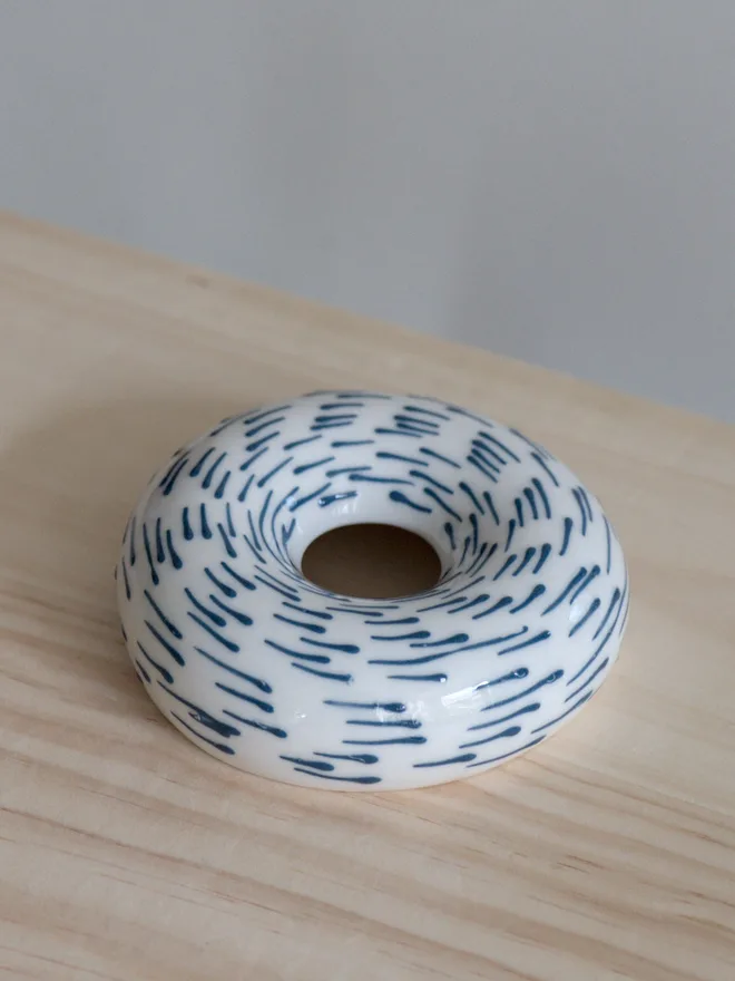 Avocado Planter White & Blue Handmade porcelain avocado planter with carved blue pattern, designed to hold an avocado seed for sprouting