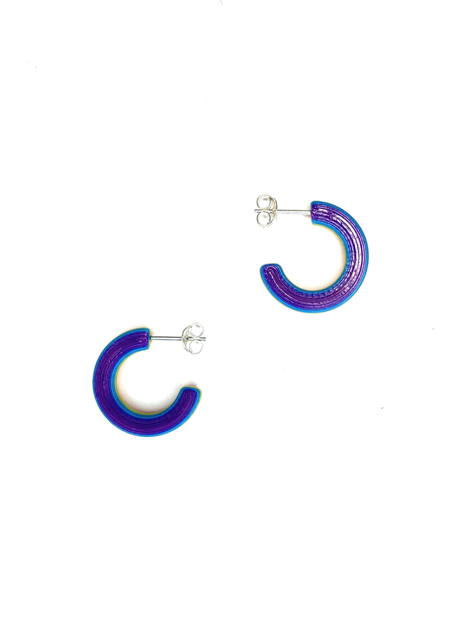 Rainbow Stripe mini hoop earrings, shown from the purple side