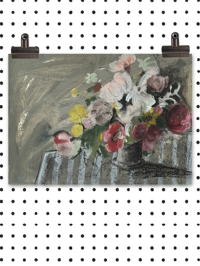 a print of a painterly floral bouquet with a sketchy feel and stripy tablecloth