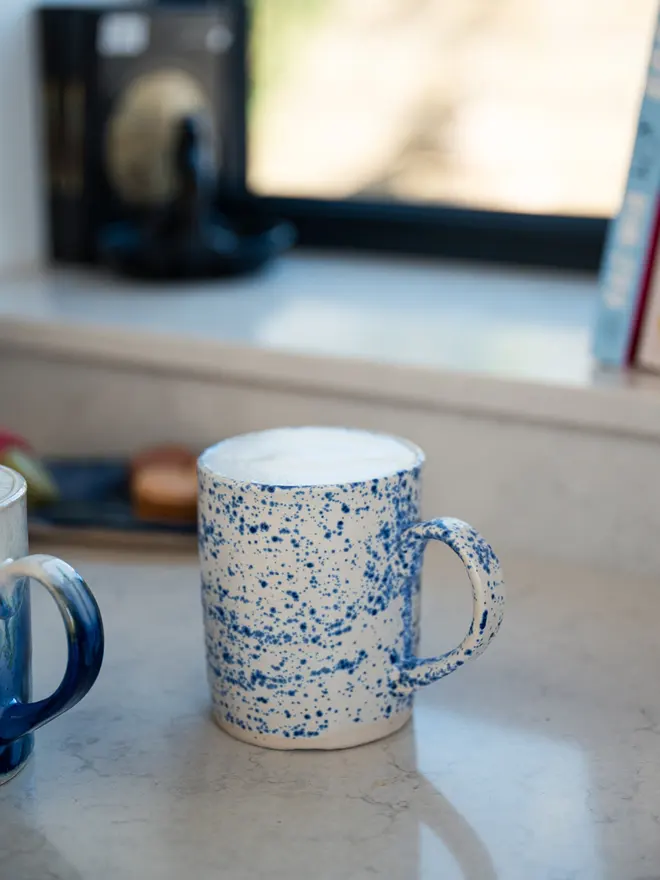 lulworth cove ceramic glazed mug, jenny hopps pottery, blue and white ceramic mug