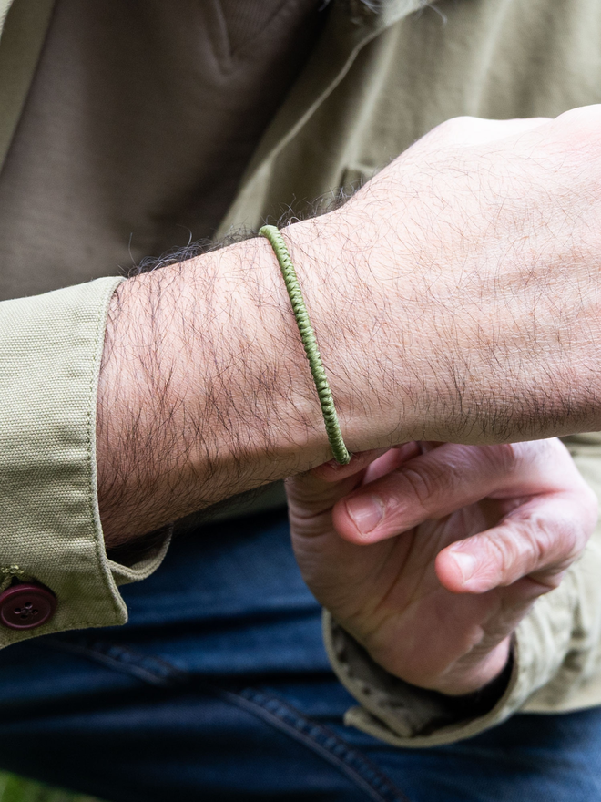 green cord bracelet
