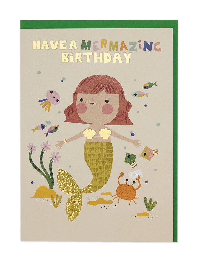 Raspberry Blossom Children’s Birthday card featuring a mermaid surrounded by an array of colourful underwater friends. The design has special gold foil details and a playful ‘Have a mermazing Birthday' message