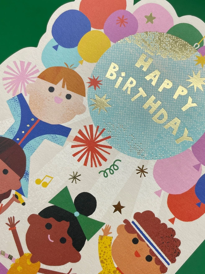 A closer look at the gold foil details on the colourful children’s birthday card