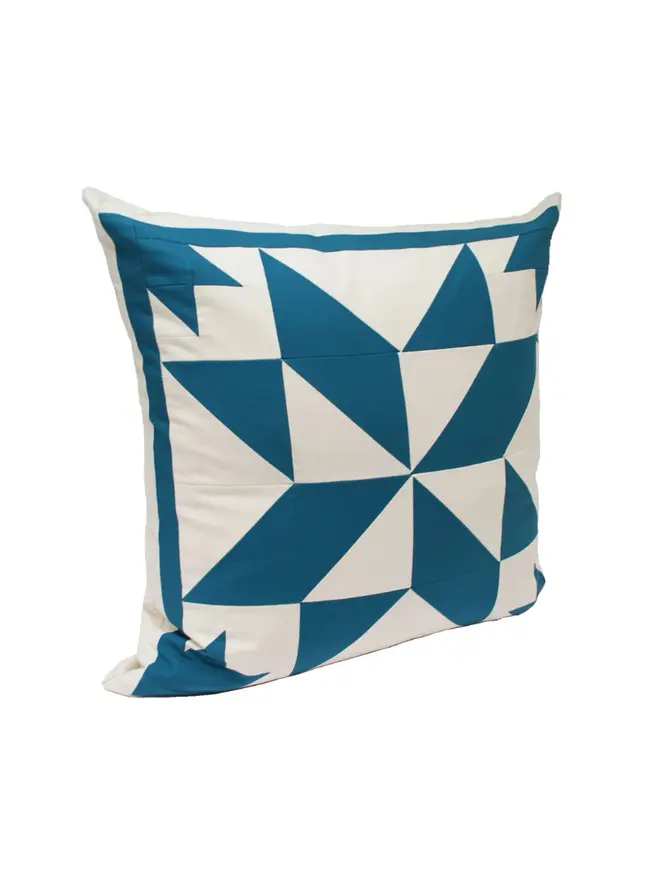 Celest Patchwork Cushion, against a white background. 