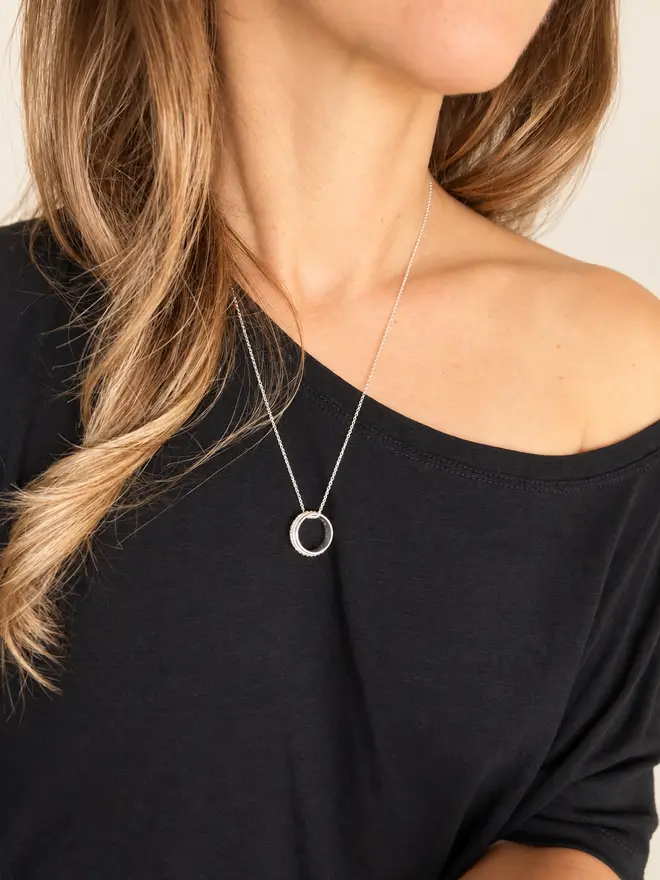 The 'Fuck Cancer' Spinner Pendant Necklace, gives you the reminder you need when the going gets tough. An adult fidget spinner to give you something tactile to do with your hands. This piece of jewellery is hand made from recycled sterling silver. Made by Celina C Jewellery, a small business in the UK, find on Holly & Co.