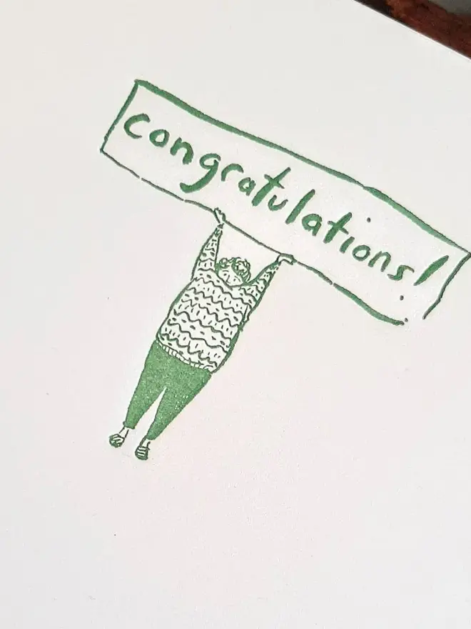'Congratulations' Letterpress Handprinted Greetings Card, a white congratulations card with a green design. 