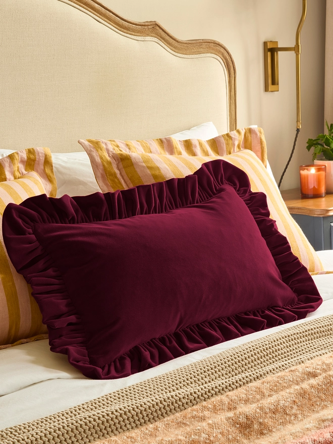 Kika Bespoke ruffled velvet cushion ruffle detail in burgundy. 