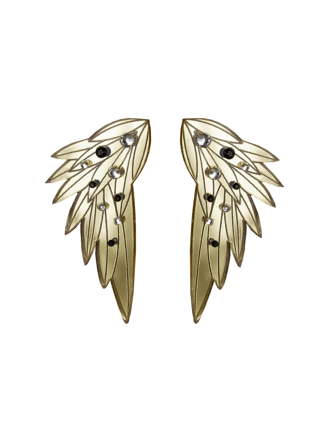 large gold wing earrings with small gems