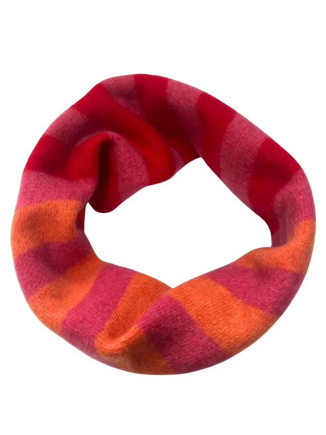 Merino Wool Snood in Red Pink orange stripes shown on white background.