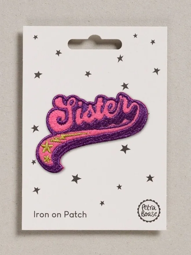 Sister embroidered iron on fabric patch, pink and magenta.