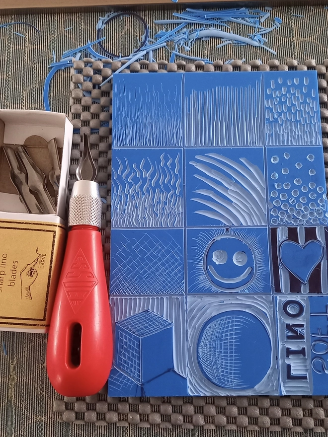 Essentials Lino Printing Craft Kit, carving utensils unpacked on table. 