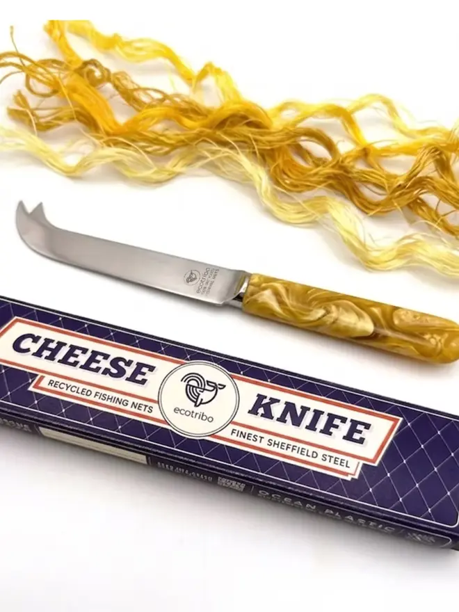 Recycled ocean plastic eco cheese knife handcrafted in the UK from recovered ghost fishing nets.