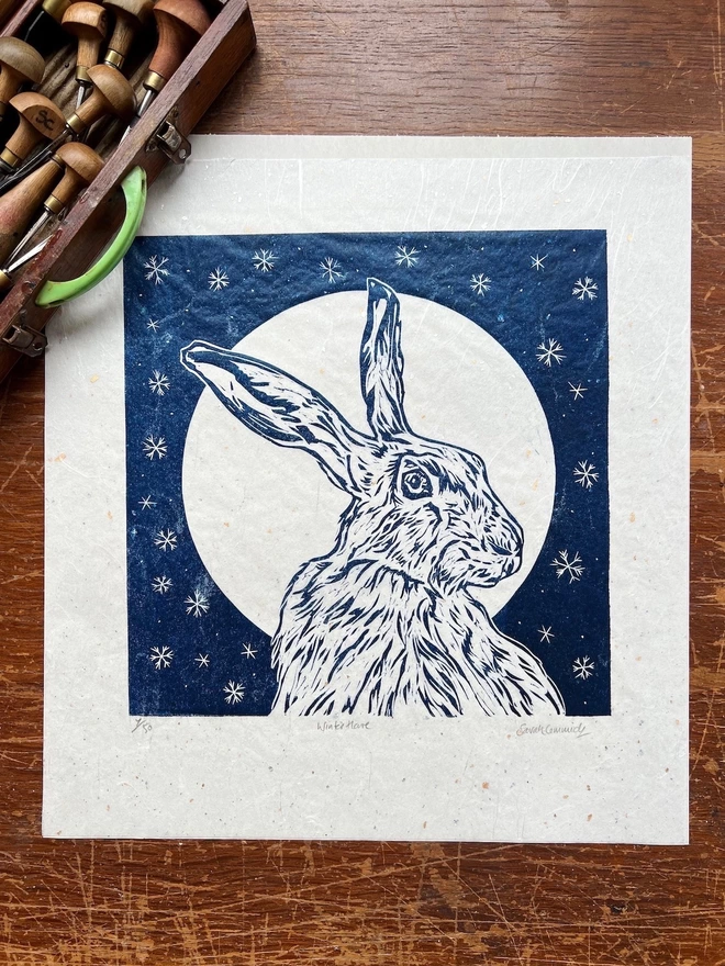 Hare  head study with snowflakes and full moon original linocut