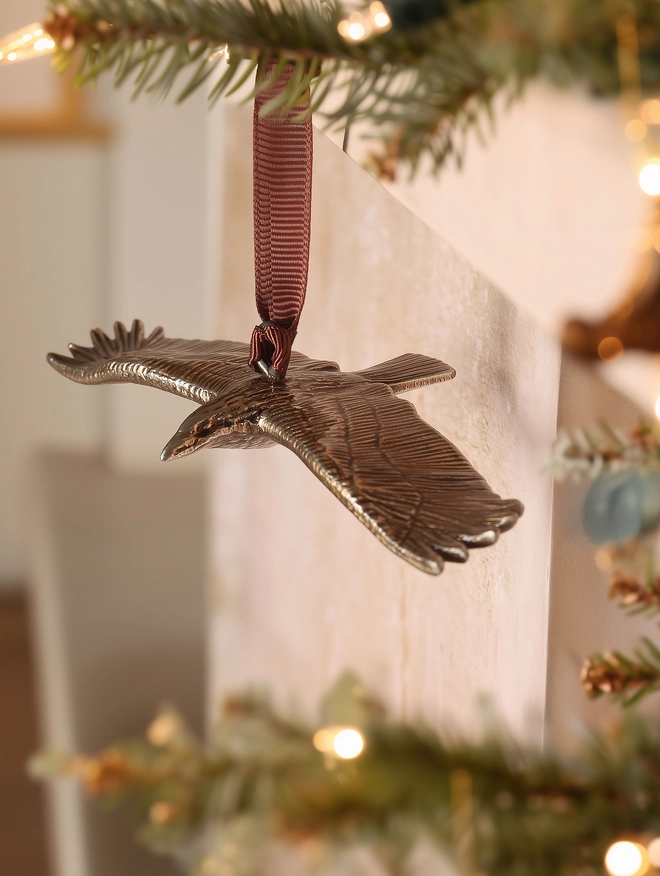 Bird Christmas tree decoration hanging from tree