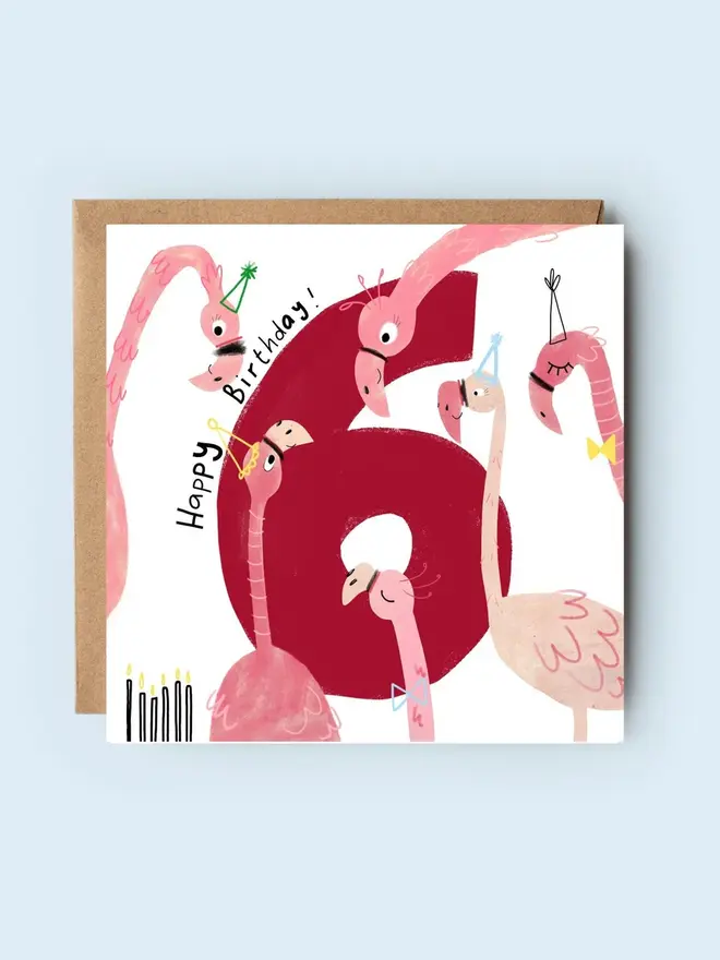 flamingoes illustrated 6th birthday card. card featuring a pink number 6 and illustrated flamingoes.