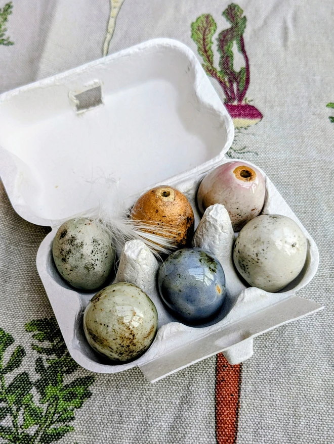 Decorative eggs in egg box