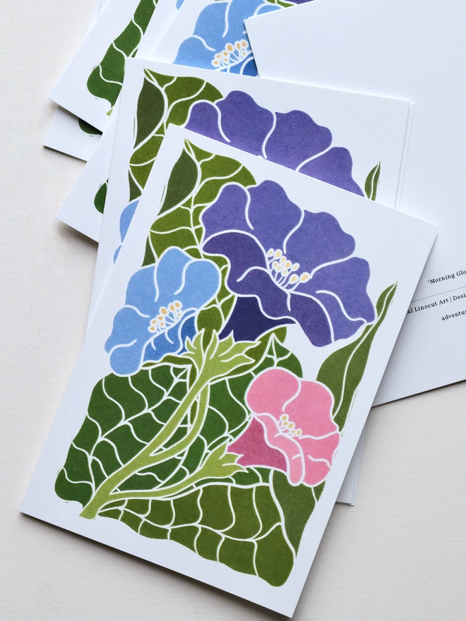 Modern botanical greeting cards with hand-carved morning glory design printed on eco-friendly recycled card stock
