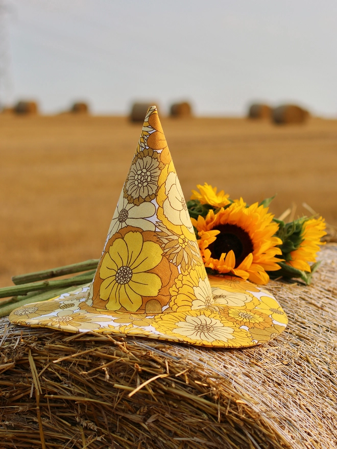 Yellow witch hat with sunflowers