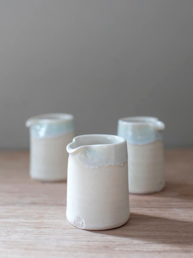 white handleless porcelain jug