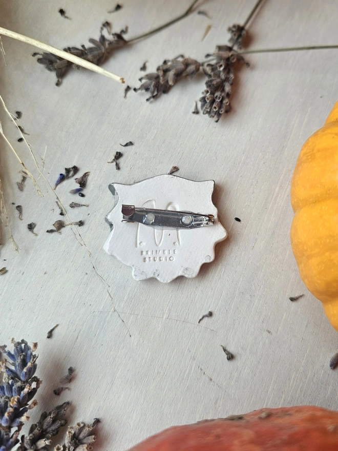 Ceramic cat brooch