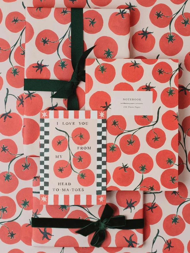 Tomatoes Notebooks tied with green ribbon in a gift flat lay