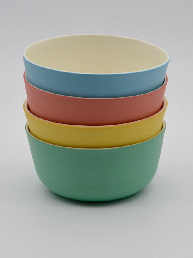 Snack Bowl. A stack of variously coloured snack bowls.