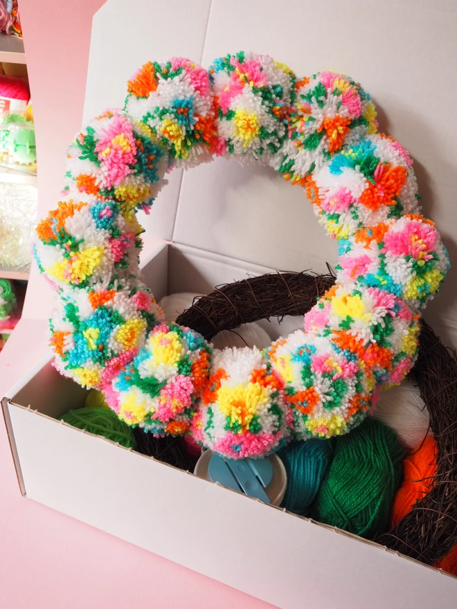 Floral meadow pom pom wreath 