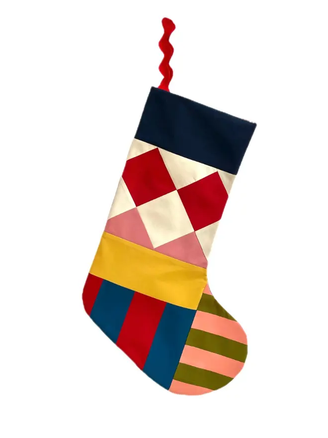 Pagliacci Patchwork Stocking, hanging. 